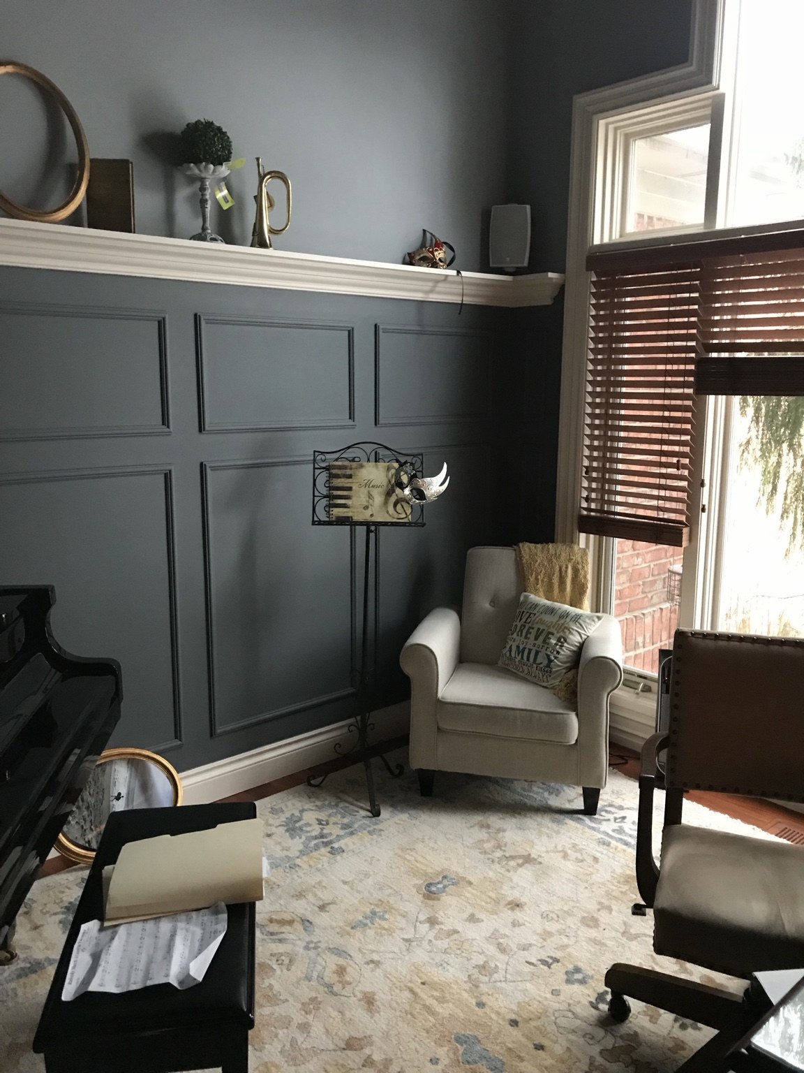 Custom wall molding and white trim in a music room